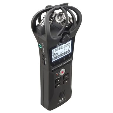 Portable audio recorder with multiple microphones and a digital display.